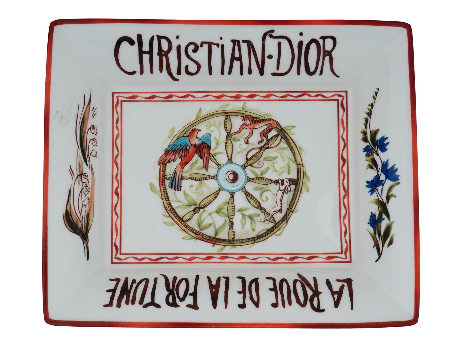 CHRISTIAN DIOR TAROT WHEEL OF FORTUNE PORCELAIN PLATE: A porcelain serving plate by Christian Dior. Tarot Dinnerware collection. Whell of Fortune, La Roue de la Fortune. Marked Dior, Made in France on the bottom. Inspired by Maria Grazia Chiuri and Agosti