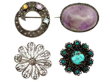 FOUR VINTAGE STERLING SILVER AND STONE BROOCHES