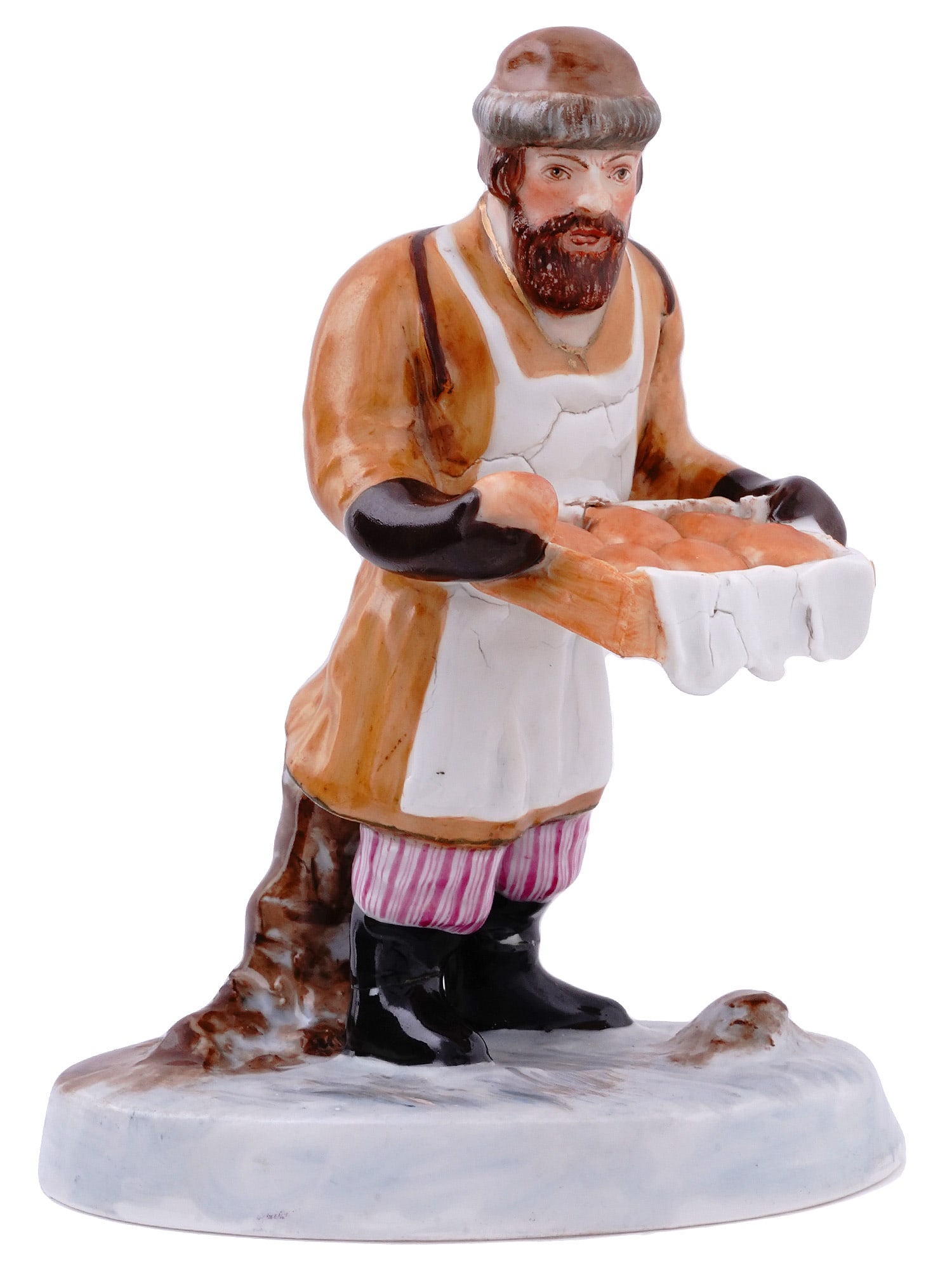 ANTIQUE 19TH C RUSSIAN PORCELAIN FIGURINE BY POPOV: An antique 19th century Russian porcelain figurine by the Popov factory. The figurine depicts a winter-dressed street merchant selling dough in a warm hat and mittens, holding his wares in his hands. 