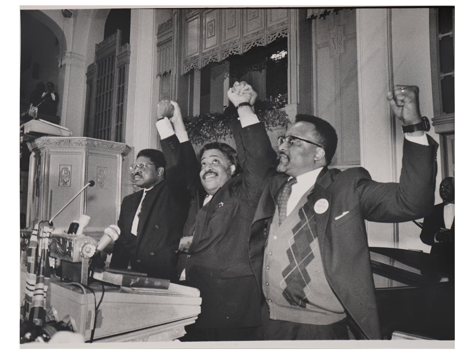 VINTAGE AMERICAN PHOTO MADDOX AL SHARPTON VERNON MASON: A vintage American photo depicting Alton Maddox, Al Sharpton, and C. Vernon Mason at Bethany Baptist Church in Brooklyn, New York, in 1994, taken by Lisa Terry for Impact Visuals. Includes credits and