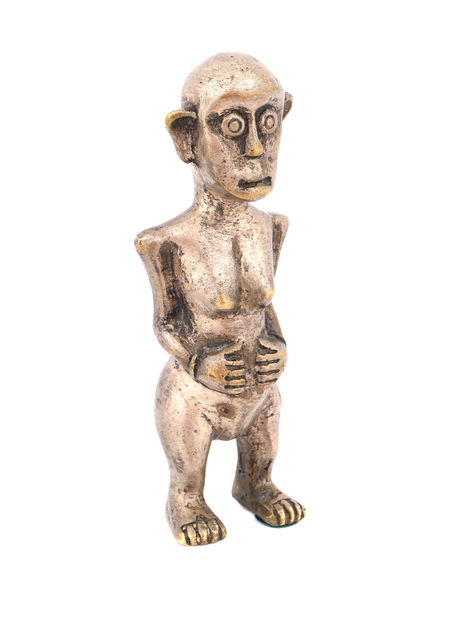 PRE COLUMBIAN INCA METAL FEMALE FIGURINE: An Inca silver-tone metal sculpture. Pre-Columbian era, ca. 1400–1500 AD. The figurine represents a standing woman holding her hands at the stomach. Exaggerated features. Collectible Metalwork, Trib