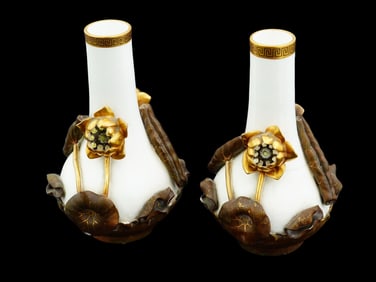 PAIR OF ASIAN MANNER RELIEF FLORAL PORCELAIN VASES