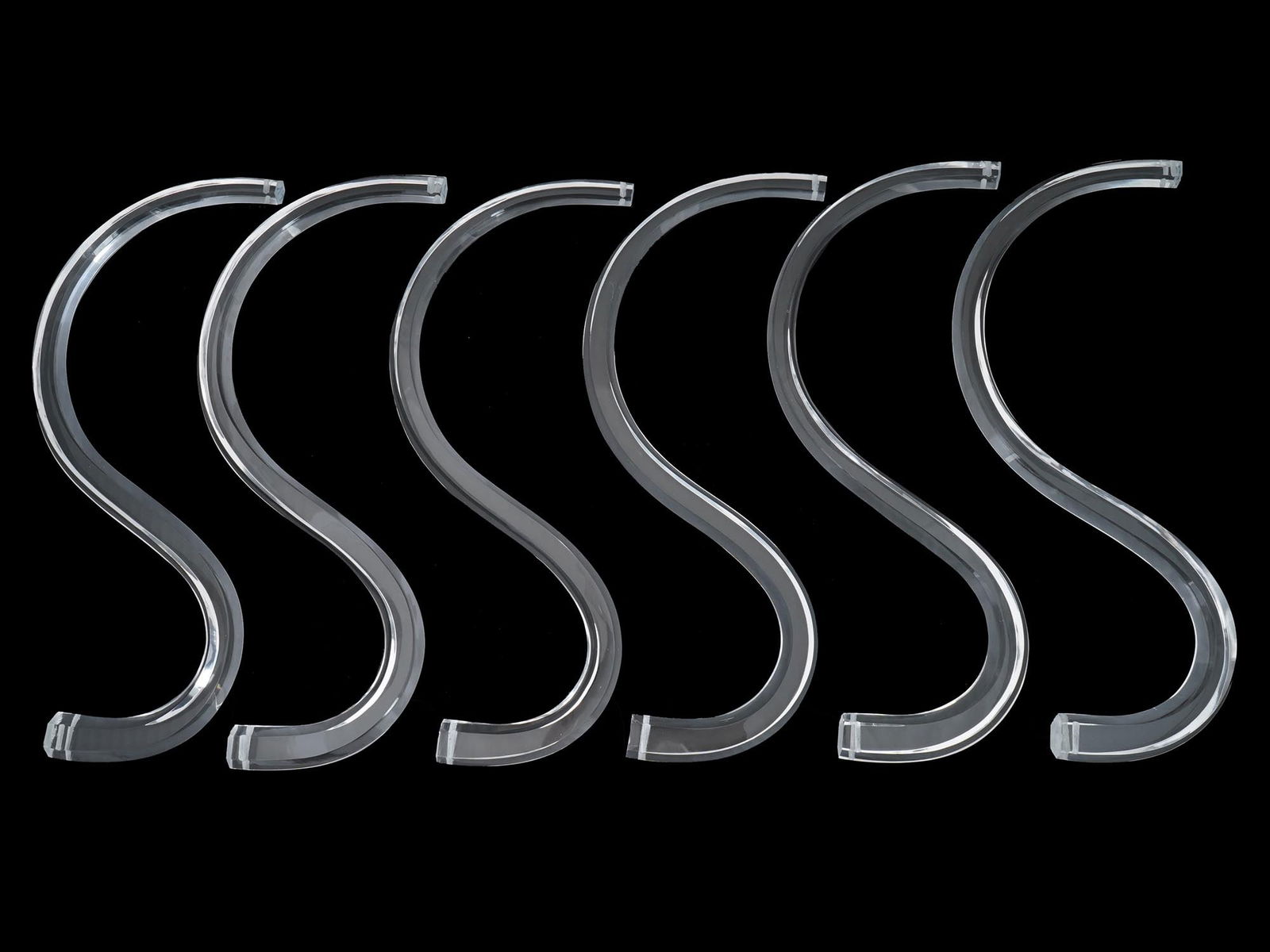 COLLECTION OF S SHAPED CLEAR CLASS PIECES FOR DECOR (1 of 5)