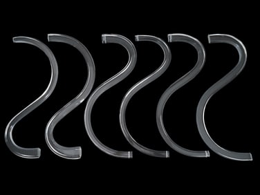 COLLECTION OF S SHAPED CLEAR CLASS PIECES FOR DECOR
