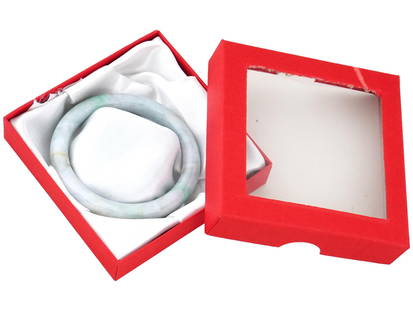 VINTAGE CHINESE WHITE JADE BANGLE BRACELET IN BOX: A vintage Chinese bangle bracelet hand carved of genuine white Jade in the round all around shape. Having a nicely polished smooth surface. Comes in a box. Asian and Oriental Hand Carved Natural Stone