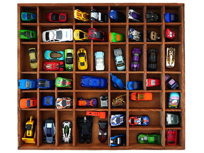 COLLECTION OF VARIOUS VINTAGE MINIATURE TOY CARS: A large collection of various vintage miniature toy cars. All cars have different designs and shapes. Most are racing. Come with a wooden box with a large number of compartments. Vintage Toys And Hobb