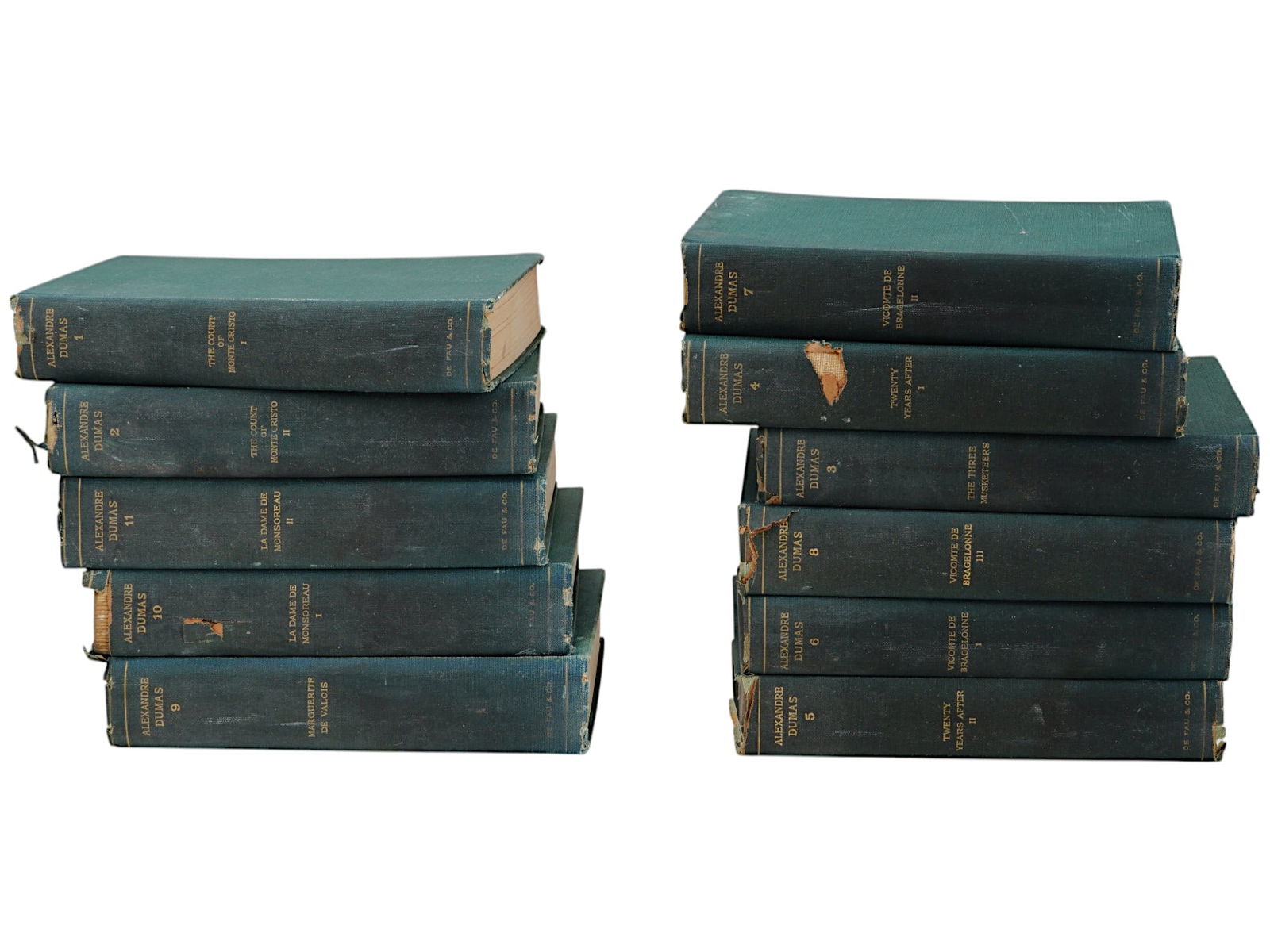 SET OF 11 ANTIQUE ALEXANDRE DUMAS BOOKS 1894 1901: A collection of 11 antique hardcover books by Alexandre Dumas with illustrations, editions 1894 and 1901. The books have green covers with gold lettering. The set includes works such as The Court of M