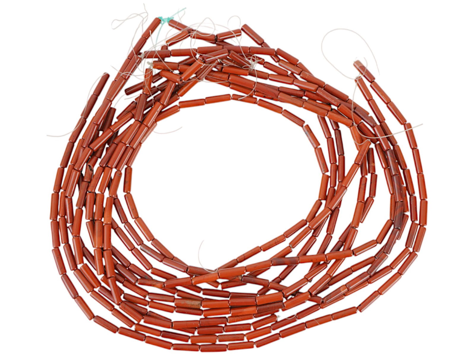 VINTAGE RED CORAL BEADS: A lot of vintage red coral beads of tube shape on strings. Beaded Jewelry, Mineral Stones.THIS LOT QUALIFIES FOR A 30-DAY UNCONDITIONAL RETURN FROM THE DATE OF SALE. BUYERS ARE RESPONSIBLE FOR RETURN