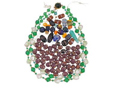 COLLECTION OF ASSORTED CARVED STONE BEADS STRINGS