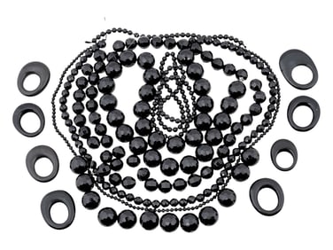 COLLECTION OF ASSORTED CARVED ONYX BEADS STRINGS