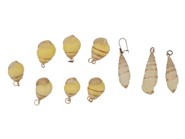 COLLECTION OF GILDED SEA SHELL CHARMS PENDANTS