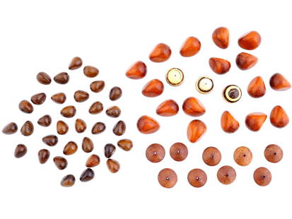 COLLECTION OF ASSORTED HAND CARVED WOODEN BEADS: A collection of assorted hand carved wooden beads. The beads are made in various sizes and shapes, mostly circular, abstract, and whirligig. Vintage and Modern Carved Wood Beads, Amulets, Accessories,