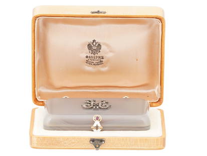 RUSSIAN 14K GOLD RUBIES DIAMONDS AGATE CIGARETTE CASE: A fine Russian 14k gold hand carved polished agate cigarette case adorned with enamel, diamonds and rubies. The lid is adorned with a relief gilt silver overlay depicting a monogram of Emperor Nichola