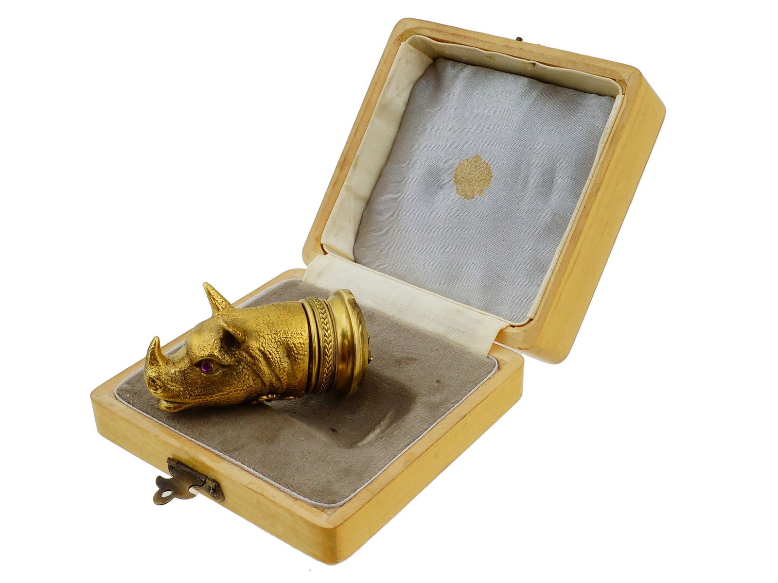 RUSSIAN SILVER ENAMEL DIAMONDS GEMSTONES RHINO PILL BOX: A Russian gilt silver pill box modeled as a rhino, the eyes are set with gemstones. Decorated with a red guilloche enamel on the hinged lid and features an applied double headed Imperial eagle set wit