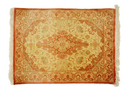 ANTIQUE HAND KNOTTED RUG CARPET WITH FLORAL MOTIFS: An antique hand-knotted rug, likely a Tabriz carpet from north-west Persia, dating to the 1920s. Finely woven with intricate floral and geometric motifs typical of the region’s craftsmanship, in a h