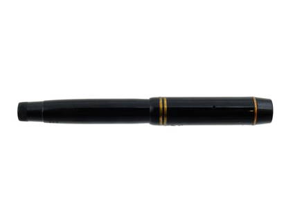 1930S MONTBLANC 322 BUTTON FILLER FOUNTAIN PEN: A button-filler fountain pen by Montblanc. Model 322, ca. 1930s. Black rubber body. Cap with gilt accents, surmounted by the star emblem. 14K gold nib. Collectible Writing Instruments And Desk Accesso