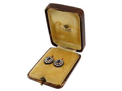RUSSIAN 14K GOLD DIAMONDS AND SAPPHIRE EARRINGS: A fine pair of Russian 14k gold, diamond, and sapphire earrings. The earrings feature deep blue oval sapphires surrounded by brilliant cut white diamonds. Hallmarked with 56 Russian gold standards for