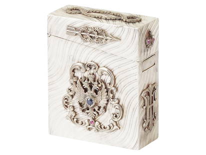 RUSSIAN SILVER BOX W DIAMONDS SAPHIRES AND GEMSTONES: A Russian silver box, adorned with diamonds, sapphires and other gemstones. The box is rectangular with a hinged lid. The exterior is decorated with flowing, wave like patterns. Centrally located on t