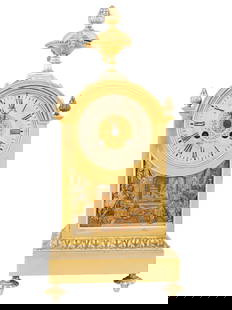 ANTIQUE FRENCH GILT BRONZE MANTEL CLOCK CLASSICAL SCENE: An antique French mantel clock, housed in an ornate glazed gilt bronze case. The clock face features engraved Roman numerals on the dial, with a relief panel below depicting figures in a classical sce