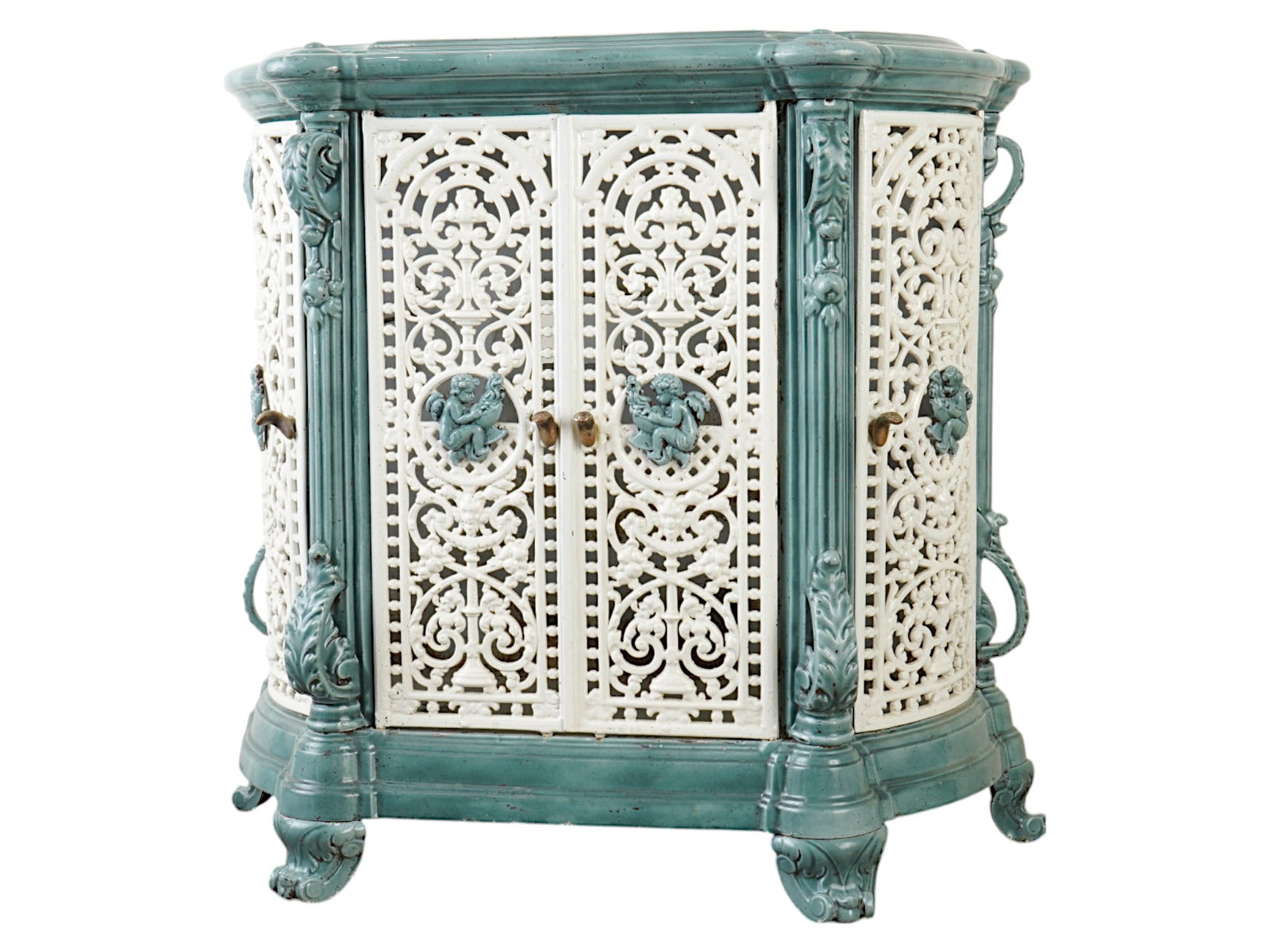 ANTIQUE FRENCH ENAMELED CAST IRON STOVE DRESSER: An antique French enameled cast iron stove dresser. Circa the late 19th century, 1880s. The item is covered with white and blue, cyan like, colors. The fine dresser has four richly decorated openwork 