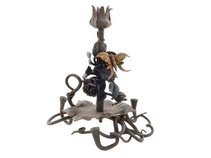 VINTAGE WROUGHT IRON CANDLESTICK W ROSES AND BUTTERFLY: A vintage wrought iron candlestick, crafted with a base and handle formed as intertwining stems. The central trunk is adorned with finely detailed wrought iron roses and a delicate butterfly, while th