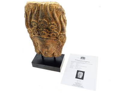 ANCIENT 12TH C SANDSTONE HEAD OF APSARA SCULPTURE W COA: An ancient head of Apsara sculpture made of sandstone from the Angkor Wat period, 12th ?entury, 1100 to 1175 AD., originating from Cambodia. Features a detailed carving of the face, hair, and headdres