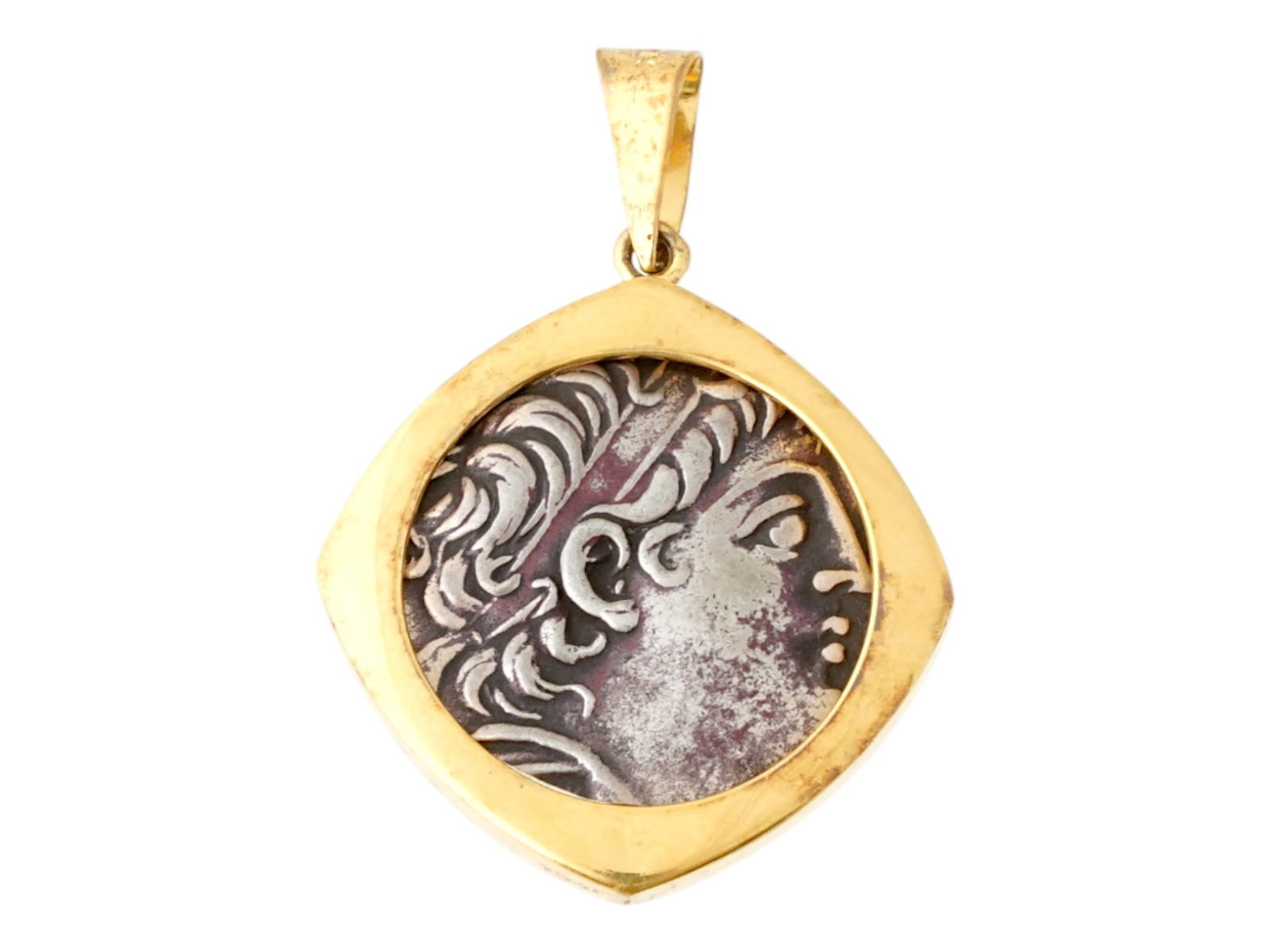 ANCIENT HOLY LAND DEMETRIUS II NICATOR COIN PENDANT: An ancient Holy Land Demetrius II Nicator coin pendant turned into a modern gold over silver vermeil pendant. The obverse is adorned with a diademed head of king right. The reverse is decorated with t