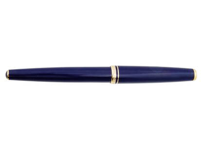 MONTBLANC GENERATION FOUNTAIN PEN WITH 14K GOLD NIB: A vintage cartridge fountain pen by Montblanc. Generation series, 2000s. Blue resin body with golden fittings. The cap is surmounted by the flat white star emblem. 14K gold nib, marked 14K, 585. Colle