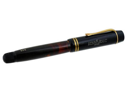 1930S MONTBLANC MODEL 332 FOUNTAIN PEN: A button-filler fountain pen by Montblanc. Model 332, ca. 1930s. Black rubber body. Gilt fittings. The cap is surmounted by the star emblem. Nib size 2. Collectible Writing Instruments And Desk Access