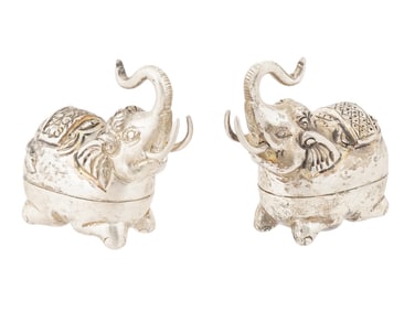 TWO CAMBODIAN SILVER BETEL ELEPHANT NUT HOLDERS