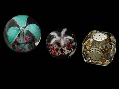 VINTAGE ART GLASS AND MEYER CLOCK PAPERWEIGHTS: A lot of three vintage paperweights. Two globe art glass pieces of floral design. One faceted clear glass paperweight with clock mechanism and multiple dials of various designs, marked Meyer Automatic