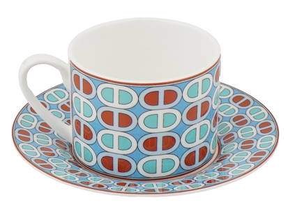 FRENCH HERMES COFFEE CUP AND SAUCER TIE SET COLLECTION: A French Hermes porcelain individual coffee set including a cup and a saucer. From the Tie Set collection. Adorned with a multicolor pattern. Marked on the bottom. French Porcelain Table Wares, Tea Se