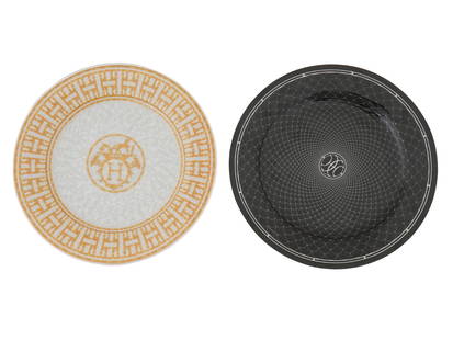 PAIR OF HERMES MOSAIQUE 24 AND H DECO PLATES: A pair of vintage porcelain dinner and dessert plates by Hermes. Screen-printed Mosaique au 24 Gold decoration. Tiny grey and golden tiles create graphic motifs at the crossroads of Art Deco and ancie