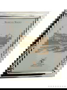 DEL CONTE STERLING SILVER WOODEN BACK PHOTO FRAME IOB: An Italian Del Conte Sterling Silver picture frame with a wooden backside. The frame is adorned with an engraved column design on the sides. Marked with a 925 Sterling Silver standard hallmark, and a