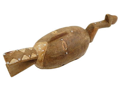 VINTAGE AFRICAN CARVED WOOD PAINTED FACE MASK: A vintage African carved wood face mask. The oval mask features complex figured decoration on the bottom and top. Narrow eye slits and a straight nose. Partially painted white and decorated with nails