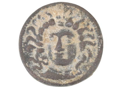 413 TO 405 BC ANCIENT GREEK SICILIAN BRONZE COIN: An ancient Greek Sicilian bronze coin. The reverse is engraved with a Medusa head. The obverse depicts a pair of figures. Circa: 413 to 405 BC. Ancient Roman Coins and Medals And Numismatic Collectibl