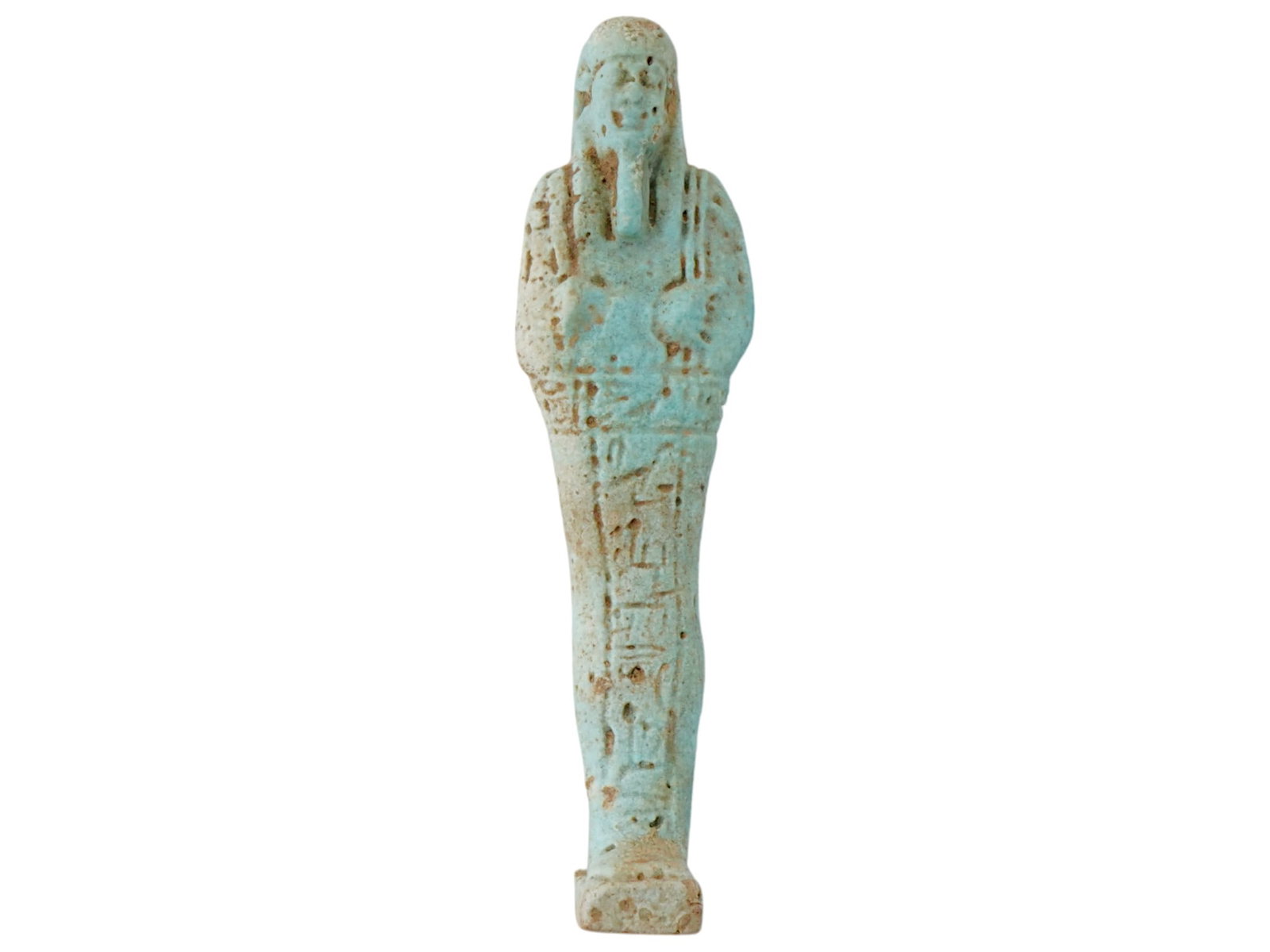 ANCIENT EGYPTIAN GLAZED CLAY USHABTI FIGURINE: An Ancient Egyptian blue-glazed clay ushabti figurine. Late Period or Ptolemaic Egypt, ca. 4th to 1st centuries BC. The ushabti or shabti is a type of funerary figurine used in ancient Egyptian funera