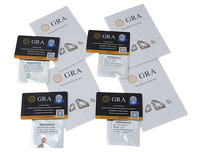 FOUR NATURAL MOISSANITE GEMSTONES 2 CT WITH COA: A lot of four moissanite gemstones, 2 ct each. Various cuts, color grade D, garnet and turquoise. The gems come in plastic protection packaging, with individual GRA report certificates and warranty ID
