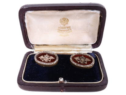 RUSSIAN GILT SILVER AND DIAMOND SET CUFFLINKS IOB: A pair of Russian gilt silver cufflinks. Each centered with the Imperial Warrant figurine with a diamond stone set inside on the red guilloche enameled ground and embellished with a diamond rim. Toggl