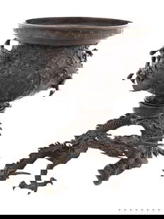 ANTIQUE JAPANESE BRONZE VASE WITH DRAGON STAND: An antique Japanese Meiji period cast bronze usubata ikebana vase consisting of the body section with a sculptural relief of a dragon intertwined with waves and a sculptural base of a writhing dragon