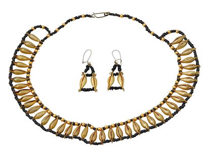 ANCIENT EGYPTIAN BEADS IN MODERN NECKLACE W EARRINGS: Ancient Egyptian beads set in a modern collar necklace and matching earrings. Necklace and earrings are adorned with gold plated lotus beads and round beads. Ancient Egyptian Gold Jewelry Art Collecti