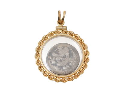 ANCIENT GREEK ALEXANDER THE GREAT SILVER DRACHM COIN: An ancient Greek Alexander the Great silver drachm pendant featuring a drachm coin set in a modern vermeil frame with an intricate wicker design round the perimeter. A loop for suspension, on the top.