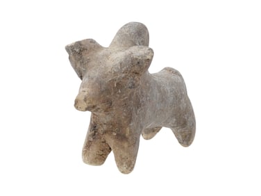 ANCIENT NEAR EASTERN TERRACOTTA FIGURINE OF A BULL