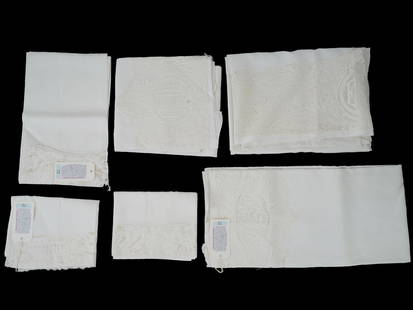 SET OF ANTIQUE 20TH CEN COMPLETE BED LINENS: A set of antique complete bed linens. Early 20th century. The lot includes 3 large sheets with wide lace border and ESW monogram. One wide sheet with tape lace trim and floral border motif in Italian