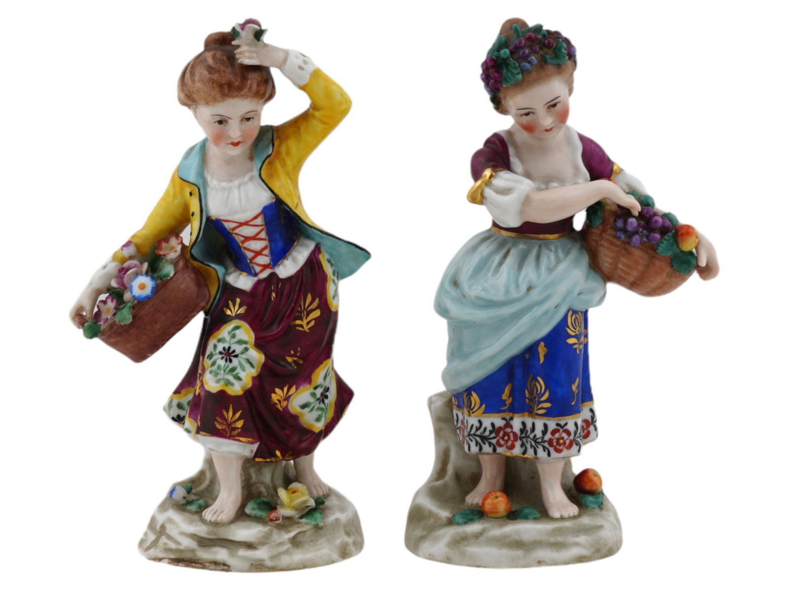 ANTIQUE 18TH C ENGLISH CHELSEA PORCELAIN FIGURINES: A pair of antique English Seasons porcelain figurines by Chelsea. Circa the late 18th century. The colorful fine female figurines represent two of four seasons: spring with a basket of flowers and sum