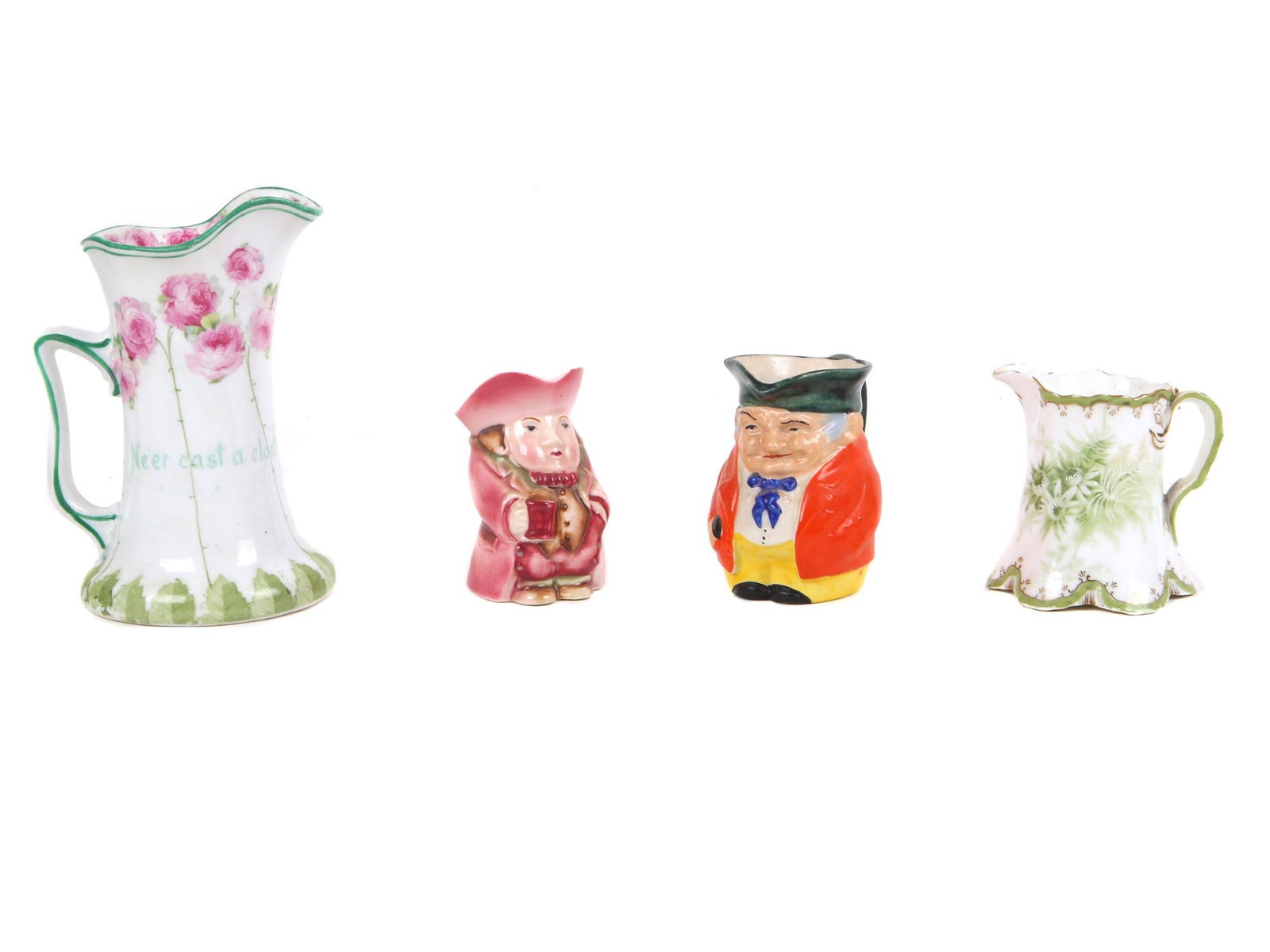 A LOT OF FOUR SMALL VINTAGE PITCHERS (1 of 5)