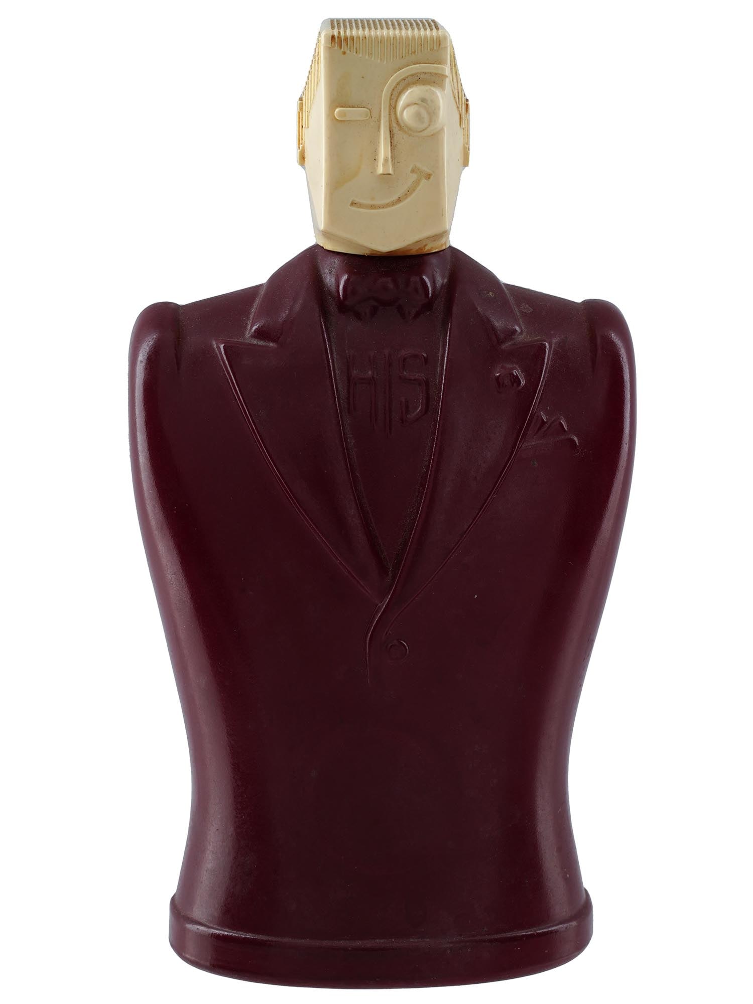NORDWOODS HIS MENS COLOGNE GLASS PERFUME BOTTLE: A vintage Northwoods His Mens cologne glass perfume bottle by The House for Men Inc.. Circa: 1940s. The bottle is made in a sculptural design representing a winking man in a burgundy costume, inscribe