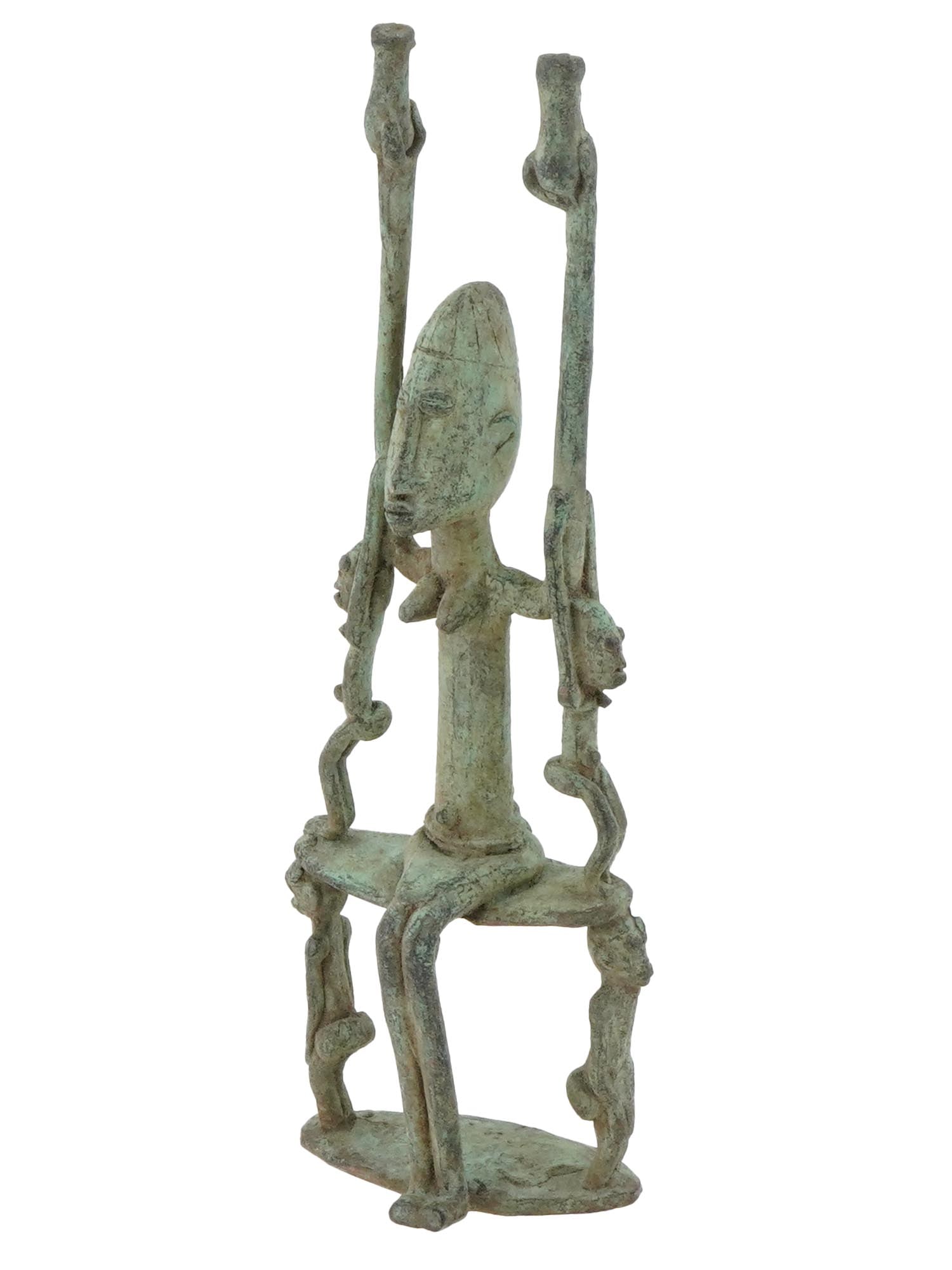 WEST AFRICAN DOGON RONZE TRIBAL RIDER FIGURINE: A West African Dogon patinated bronze tribal human figurine. The figurine probably depicts a seated elephant rider with raised hands on the sides, engraved with facial features and detailed ornaments.