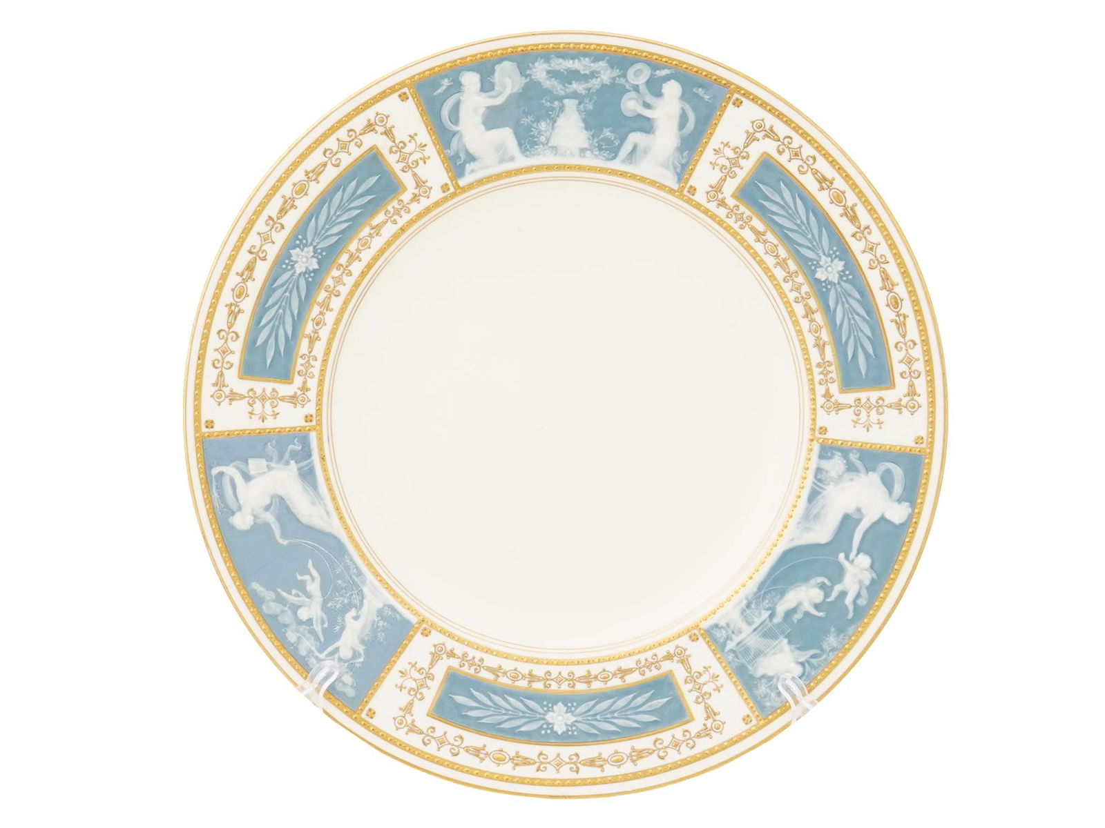 MINTON TIFFANY AND CO ENAMEL GILT PORCELAIN PLATE: A Minton Tiffany and Co white enamel porcelain plate. The border features scenes of classical figures, and leaf motifs. Gilt trim borders the plate rim. Marked on the back side. Antique and Vintage Ca