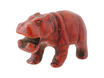 ANCIENT EGYPTIAN PTOLEMAIC CARVED RED JASPER HIPPO FIGURE: An ancient Egyptian carved red jasper stone figure or amulet representing a hippopotamus with an open mouth. Ptolemaic Egypt, 305 to 30 BC. In ancient Egypt, the hippopotamus was a multifaceted symbol